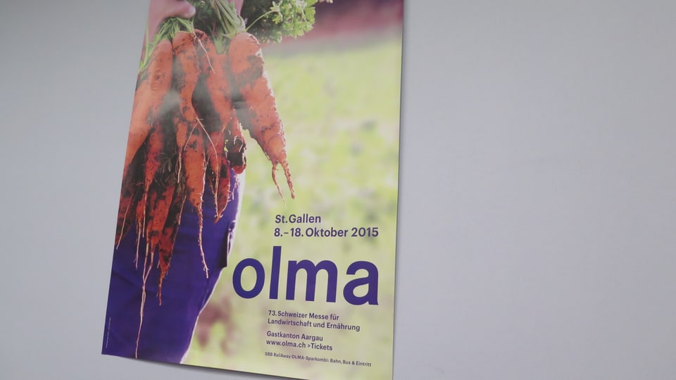Werbeplakat der Olma mit einem Bild von Karotten