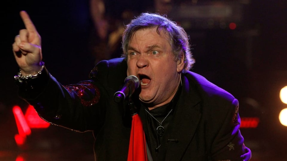 Meat Loaf mit Finger zeigend.