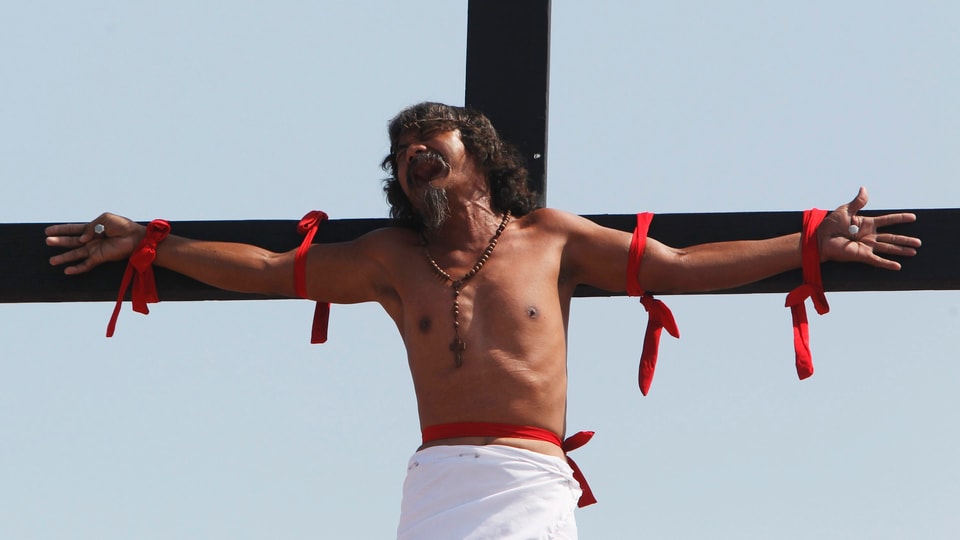 Mann am Kreuz