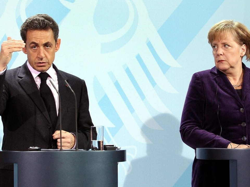 Nicolas Sarkozy (l) und Angela Merkel