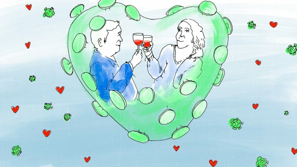 Ein Mann und eine Frau trinken Wein in einem herzförmigen Raum, der an einen Coronavirus erinnert.