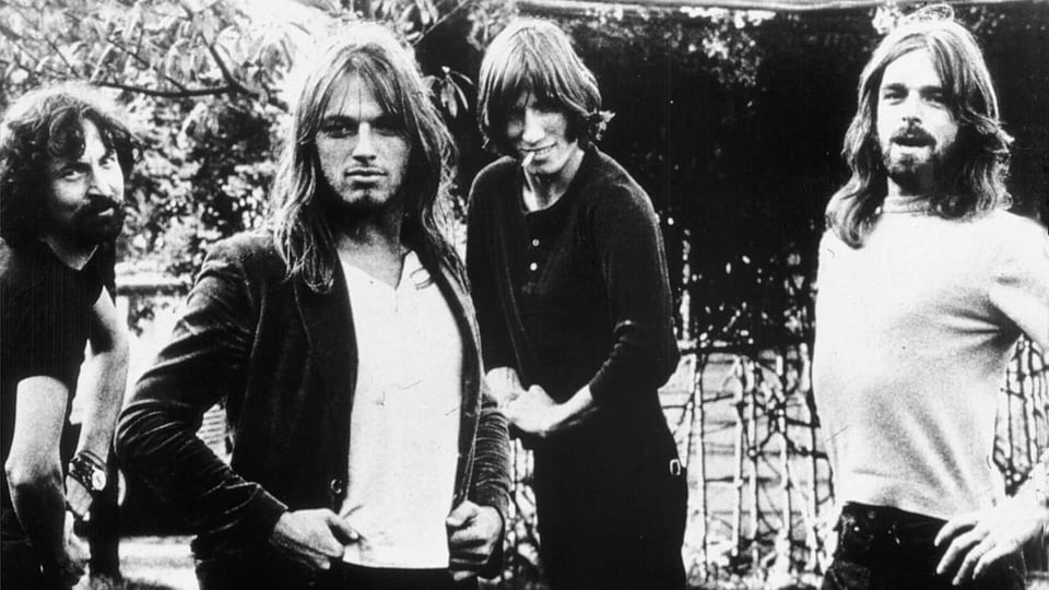 Schwarz-weiss Foto der vier Bandmitglieder von Pink Floyd