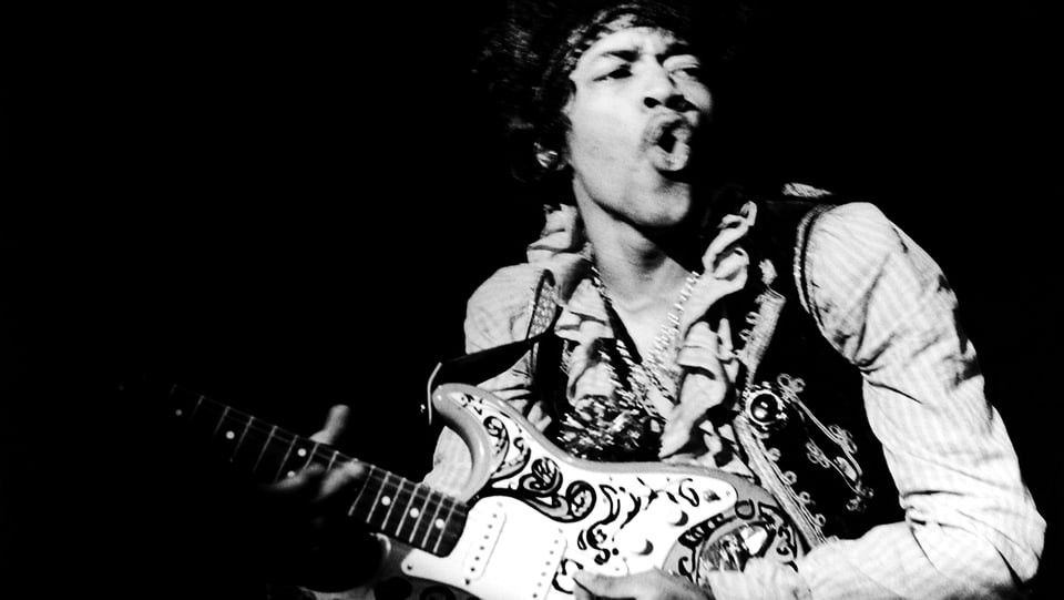 Jimi Hendrix spielt Gitarre