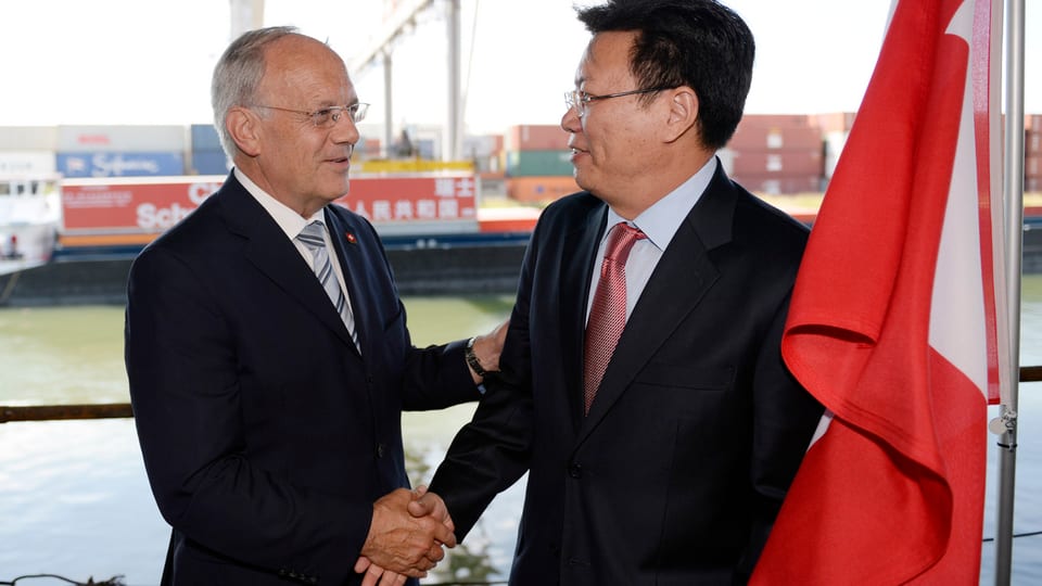 Bundesrat Johann Schneider-Ammann und Yu Jianhua, Botschafter Chinas bei der Welthandelsorganisation WTO
