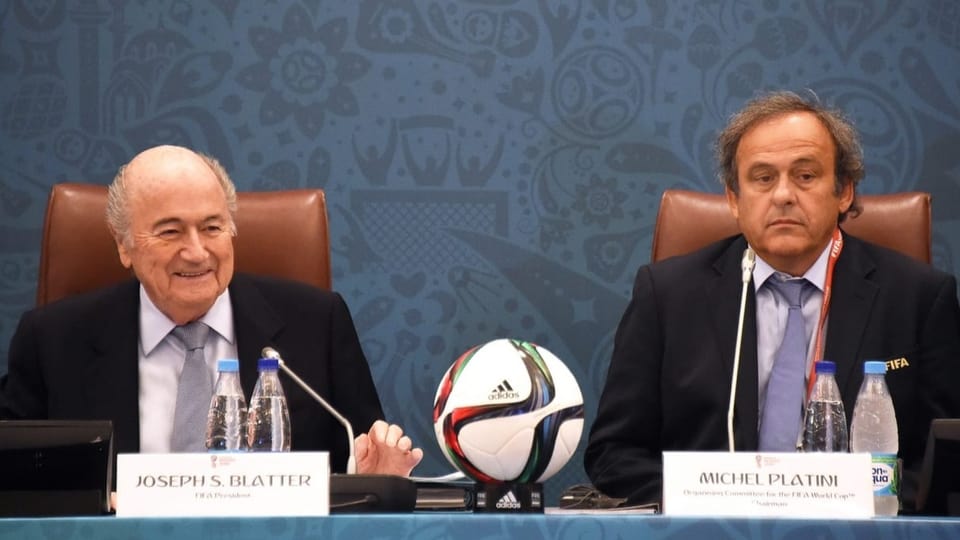 Blatter und Platini an einem Tisch