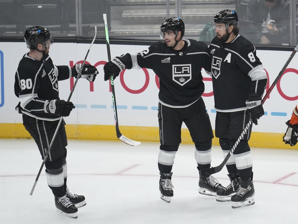 Kevin Fiala greets his teammates.