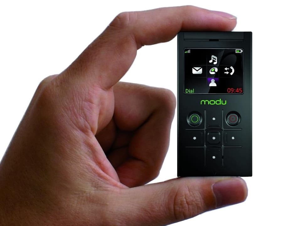 Das bisher kleinste Handy der Welt heisst Modu und ist 40g leicht. Trotzdem kann man damit SMS schreiben, Musik hören, Fotos aufnehmen und telefonieren.