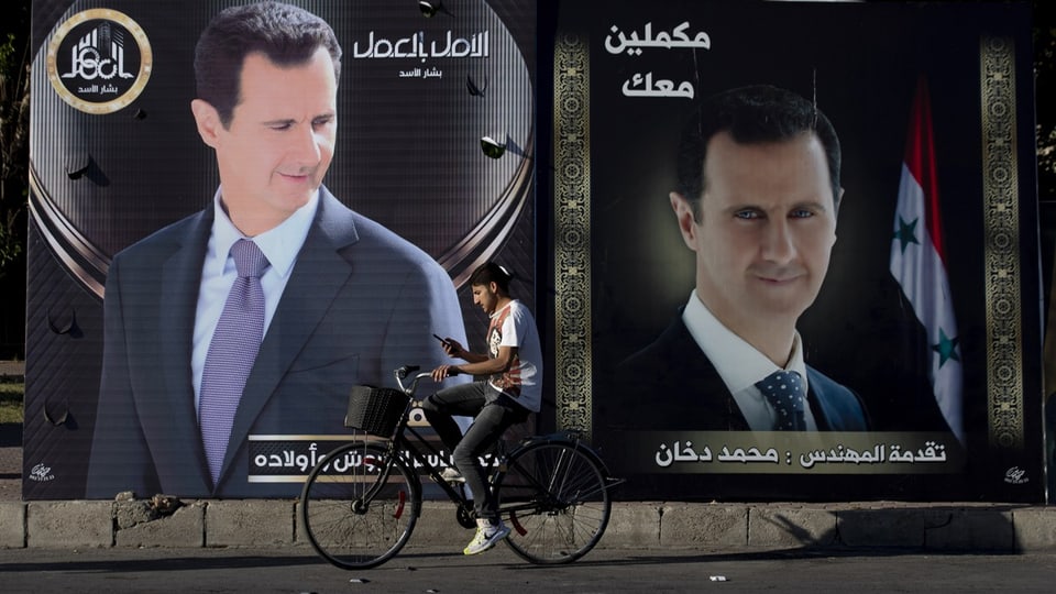 Plakat vom Präsidentschaftswahlkampf von Al-Assad 2021 in Damaskus.