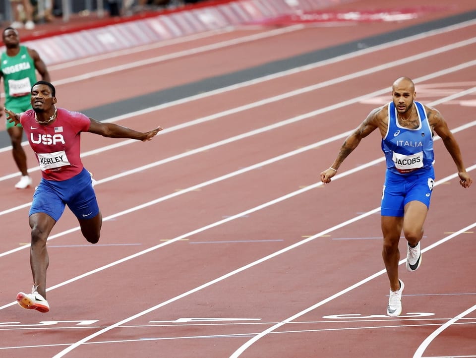 Kerley und Jacobs beim Zieleinlauf.