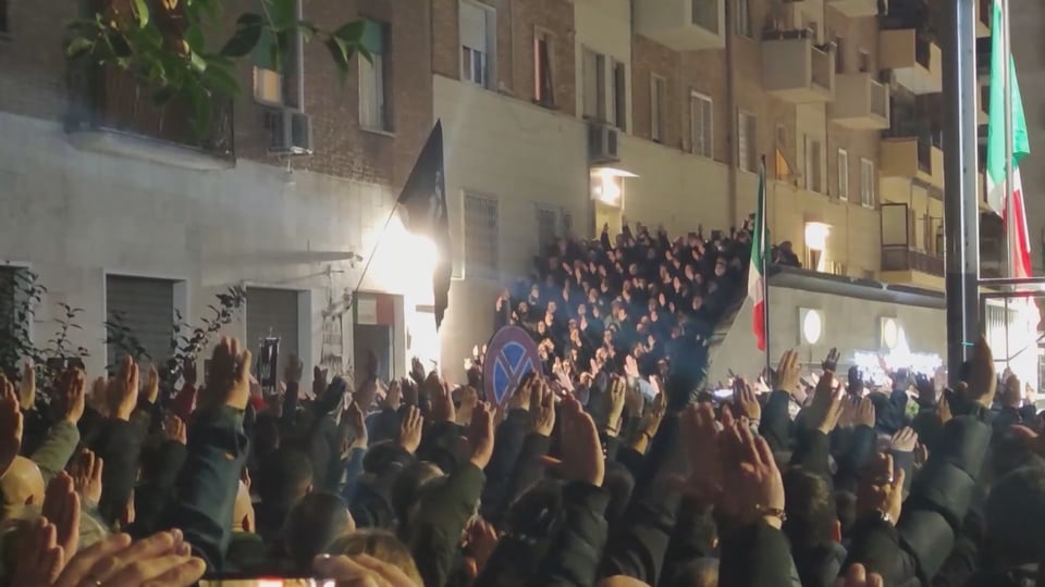 Many raise their hands in fascist salute