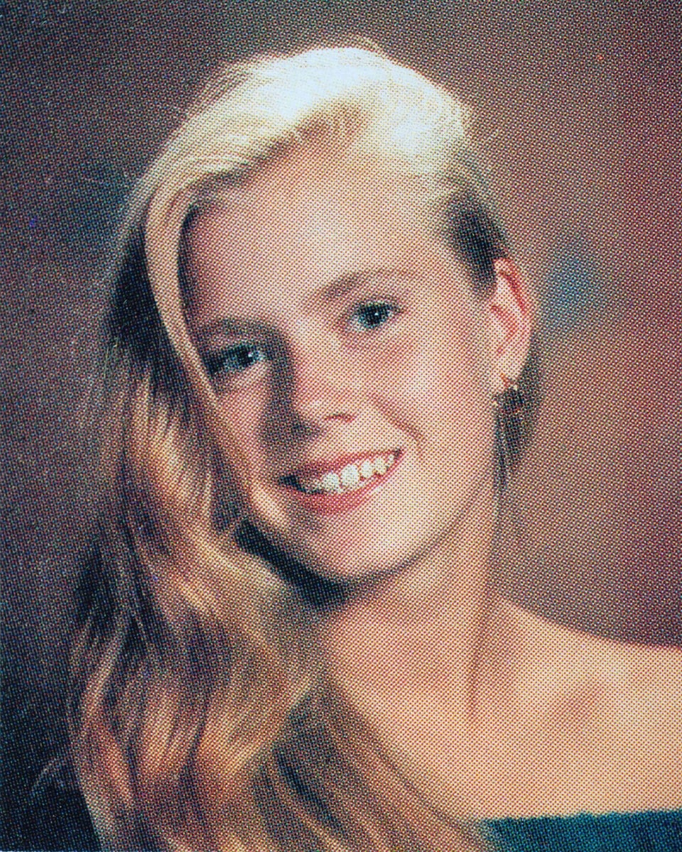 Color photo of a young white woman with blonde hair.