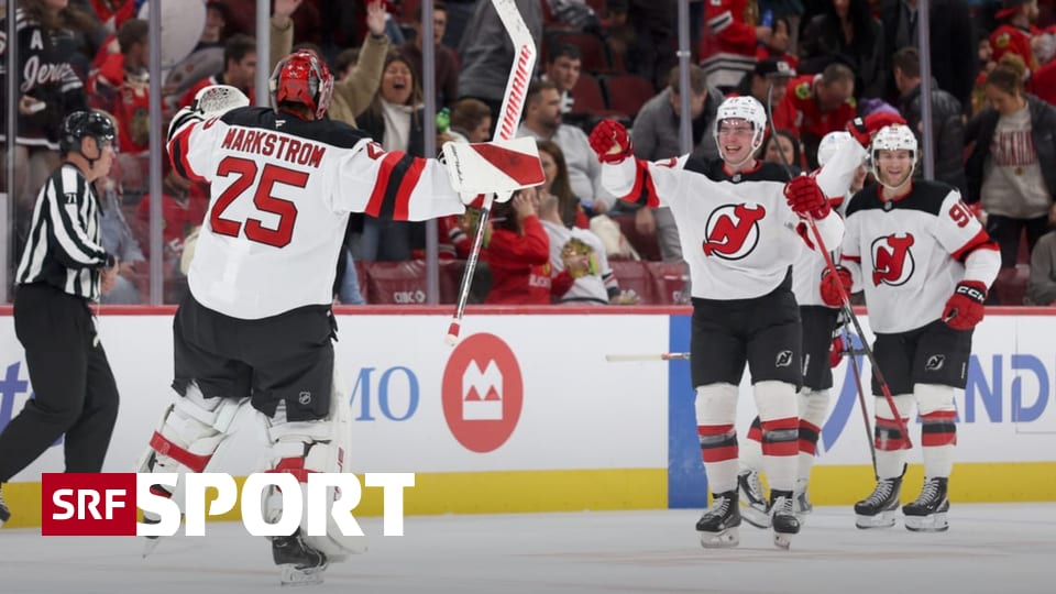 NHL-4-3-n-V-gegen-Chicago-Verteidiger-mit-Tordrang-Goalie-mit-bersicht-Devils-siegen